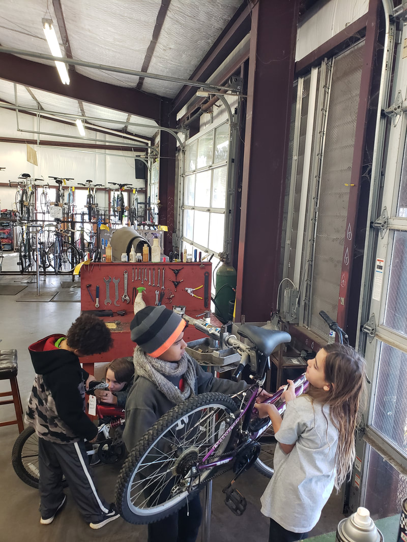Building a Fleet of Bikes at Yellow Bike Shop - ROVING LEARNERS